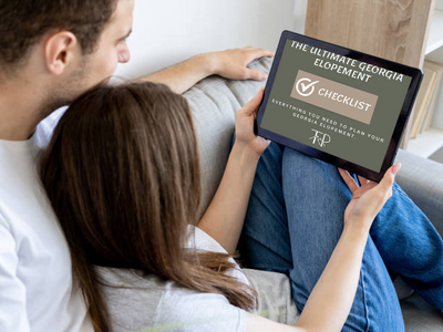 Couple looks at a guide on their tablet
