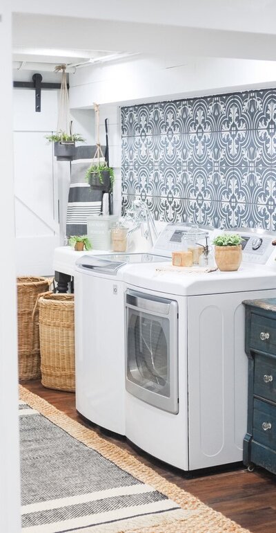 Bright room of laundry room with blue textured wallpaper