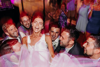 bride and her friends laughing