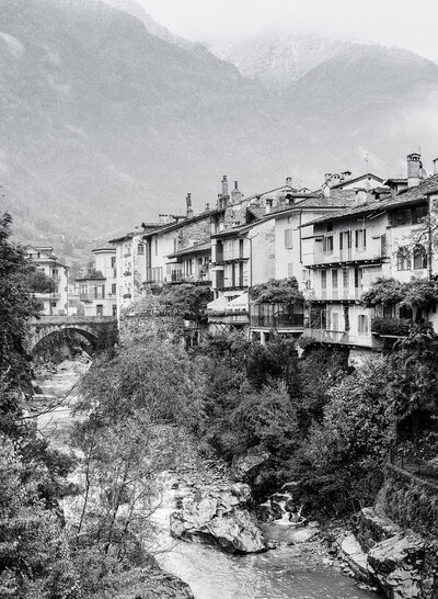 Black and white film photograph of village in the Alps