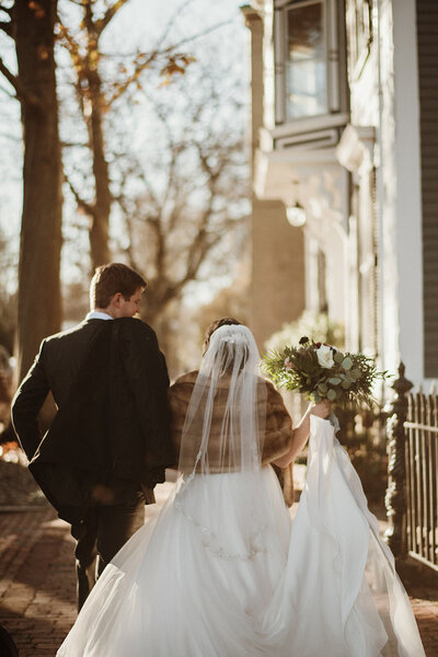 Bride and groom walking together, UME (New England Wedding Planners) helped with wedding