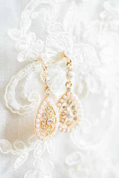 Gold earrings and white lace bridal veil by Tucson Wedding Photographer Bryan and Anh of West End Photography