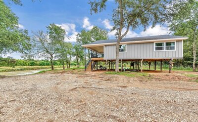 Large deck overlooking the Brazos River at this 2 bedroom 2 bath bungalow near downtown Waco, TX