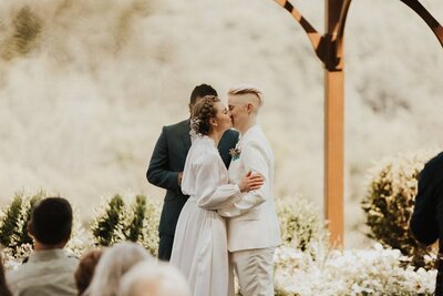 Couple kissing at wedding ceremony, Berkshire Farm Wedding