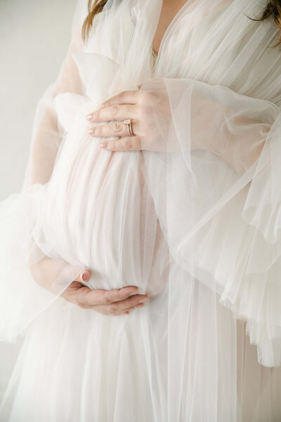 dreamy maternity tulle gown at cedar falls photo studio