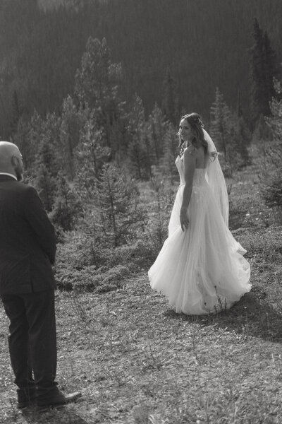 Revelstoke elopement photographer, detail photo of grooms shoes on mountain rock