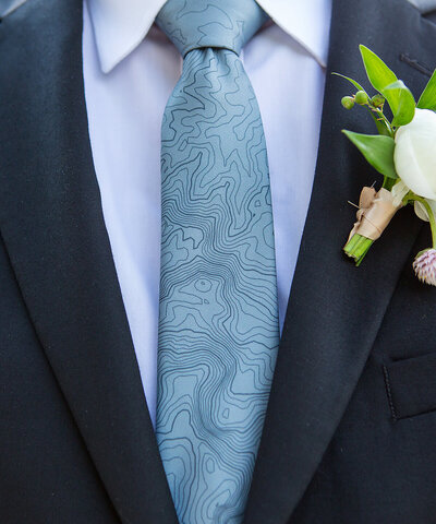 elopement tie detail with topo map