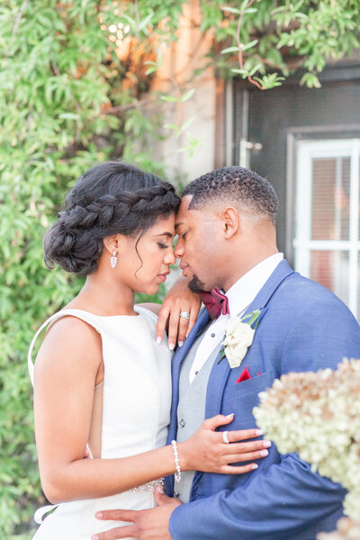 A bright and airy wedding portrait of a black bride and groom at their wedding at Stratton Hall in Chattanooga Tennessee by Jennifer Marie Studios, Atlanta's top wedding photographer.