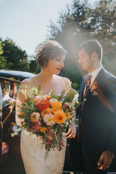 Bride holding colorful summer  bouquet at wedding in Austin, Texas
