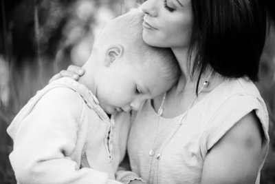 Mom holding son close by Orlando Portrait Photographer