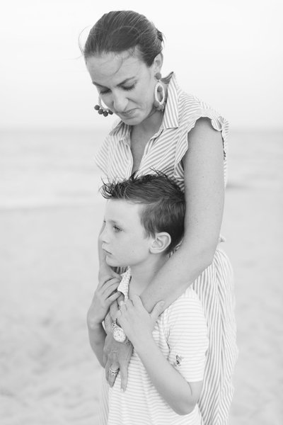 black and white family photo session on the beach