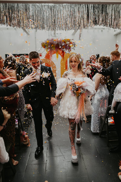 Night flash photos of a couple eloping in Dublin.
