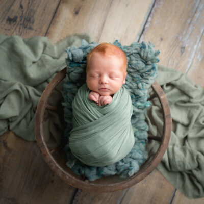 A perfect red headed newborn photo by Utah photographer.