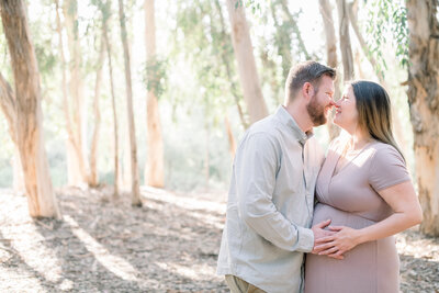Maternity photos taken in the forest of Lake Forest, Serrano Creek Park