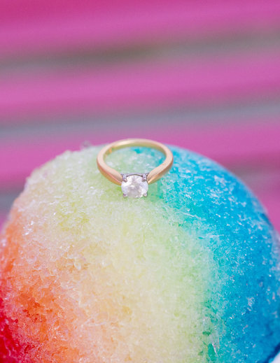 wedding ring on top of a snow cone