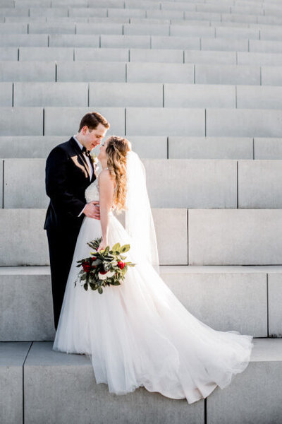 cleveland wedding photographer captures bride and groom on steps at Lakewood park