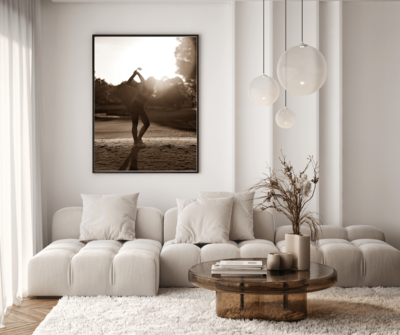 a senior photo taken by Liza Hondros Photography hanging in a neutral tone living room