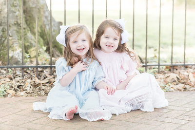 southern girls in blue and pink smocked dresses
