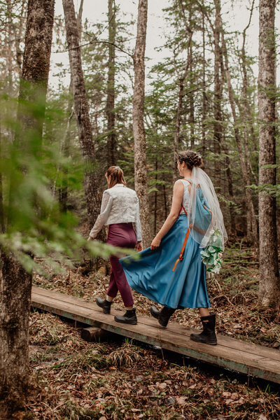 Two people eloping in the woods