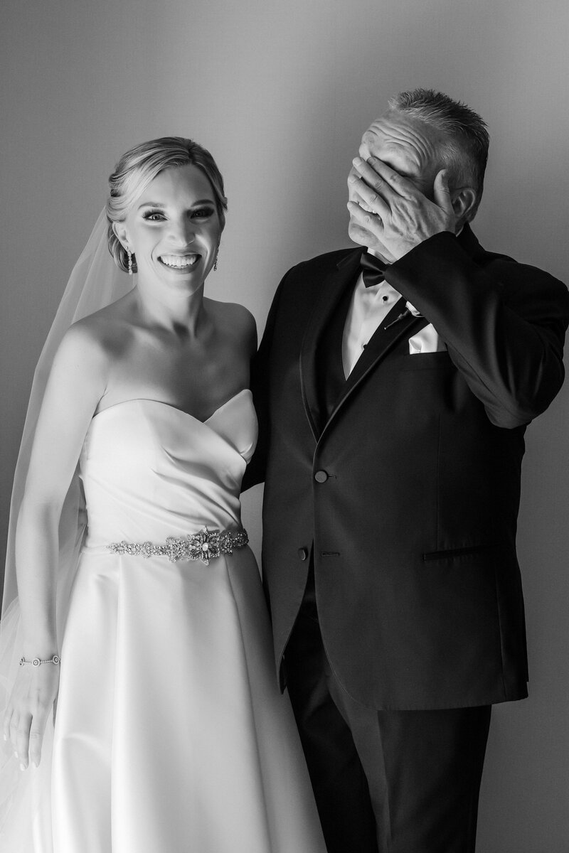 Father of the bride get's emotional when he sees his daughter in her wedding dress for the first time.
