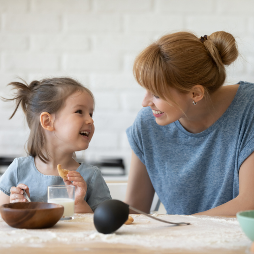 Thrive by Spectrum Pediatrics image for virtual intensive tube weaning is a child happily eating with mother during mealtime