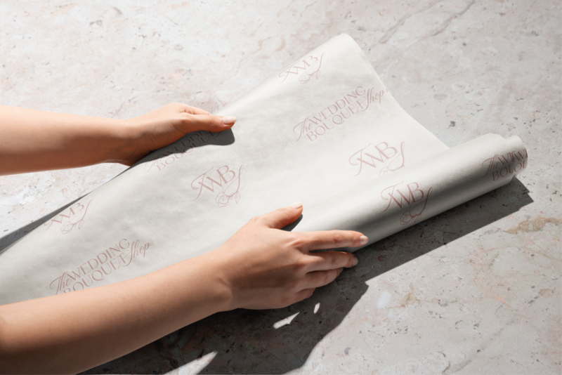 Custom branded tissue paper for floral designer brand identity created by Knoxville brand agency Liberty Type