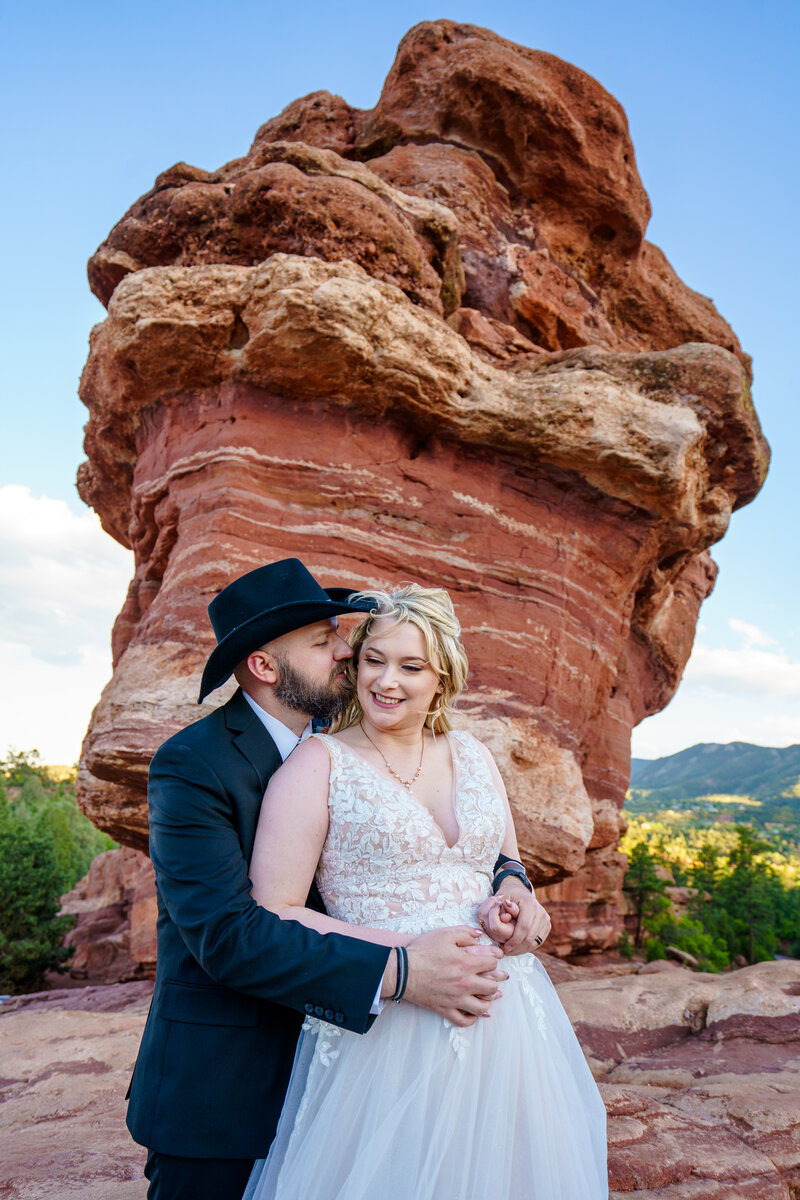 Tearful vow exchange during intimate Colorado elopement ceremony in secluded mountain location