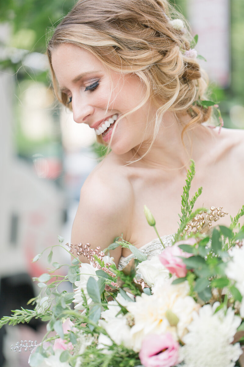 bridal portrait with gorgeous florals outside George Peabody Library in Baltimore Maryland