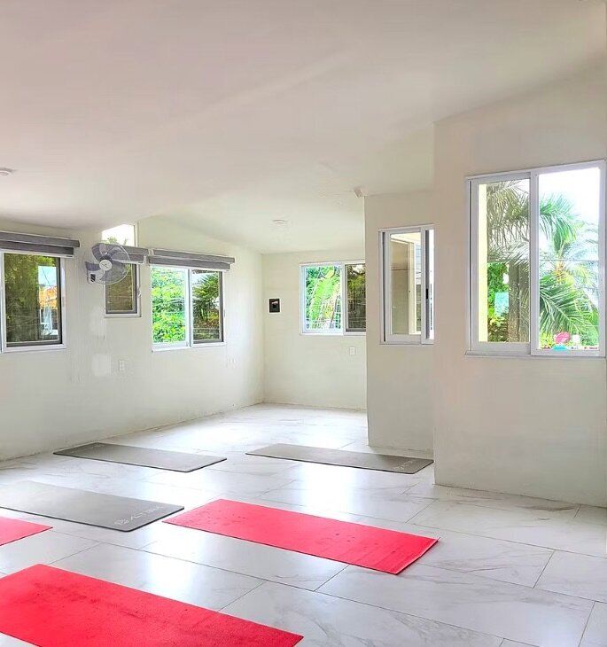 A serene setting at Rinconada Holistic Center showcasing a yoga session and healing ceremony that promote relaxation, balance, and self-discovery.