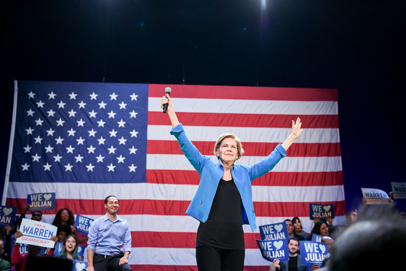 Elizabeth Warren 2020 democratic presidential primary in front of American Flag