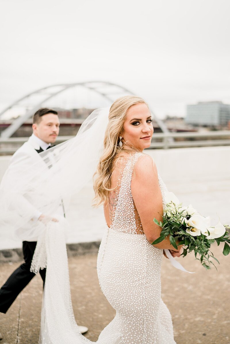 couple walking by the river by Knoxville Wedding Photographer, Amanda May Photos