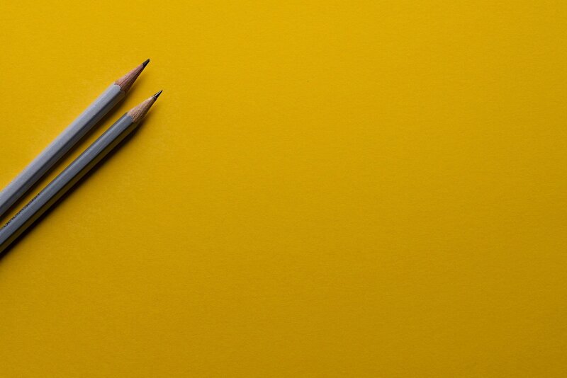 Writing Pencil in Yellow Background