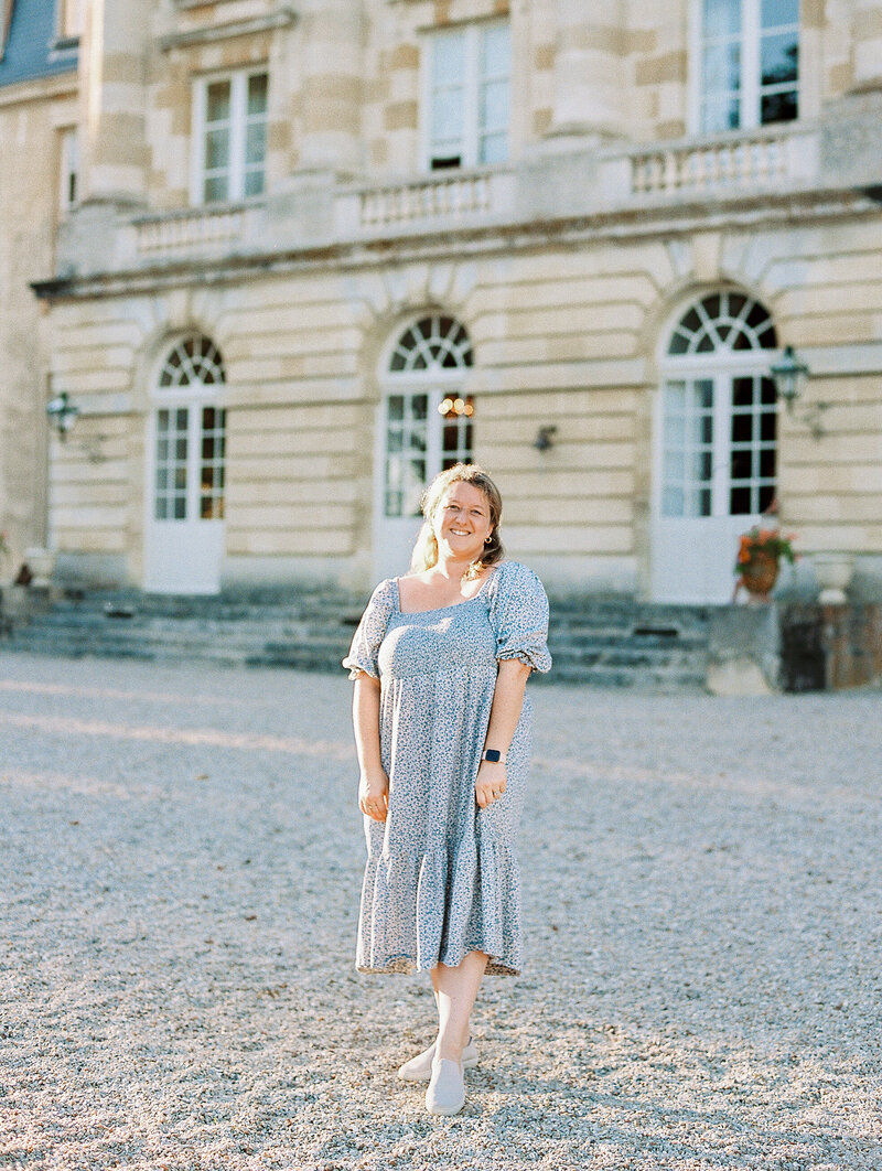 Destination Film Wedding Photographer Katie Trauffer outside Chateau de Courtomer