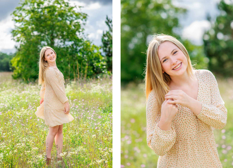 high school senior girl posed in wild flower field wearing a light cream dress