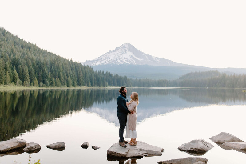 sunrise trillium lake couples session with mountain in the background mt hood