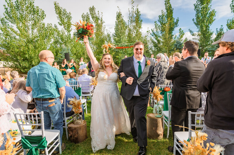 Jackson Hole photographer captures couple celebrating after Grand Teton wedding