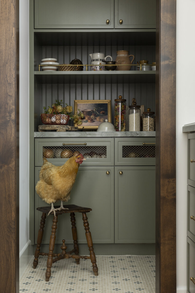 Orange county interior designer kitchen remodel. Butler's pantry with painted cabinets with brass hardware, quartzite countertops and white oak wood floor.