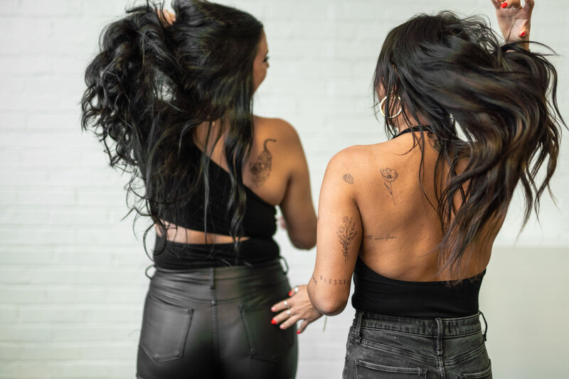 Luxury fine-line tattoo experience in Pittsburgh featuring soft, hand-drawn custom artwork.