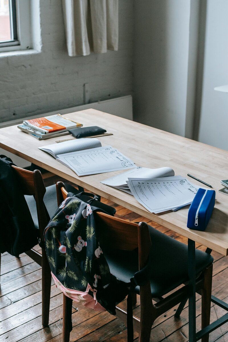 Two tests sitting at an empty table