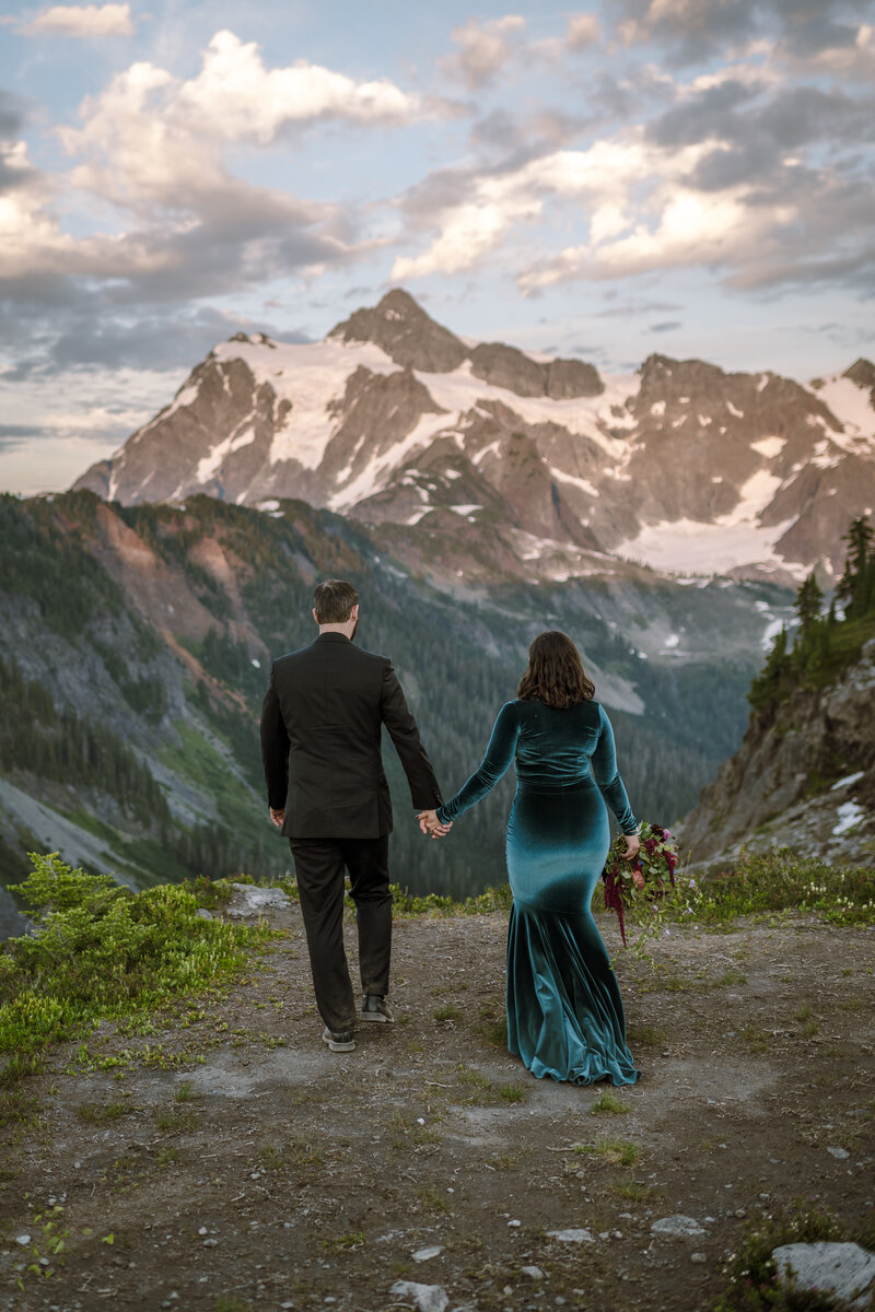 adventurous bride and groom elope by a waterfall