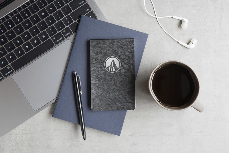 Summit-Investment-Logo-On-Leather-Book