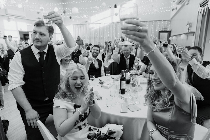 Guests Cheers at Wedding