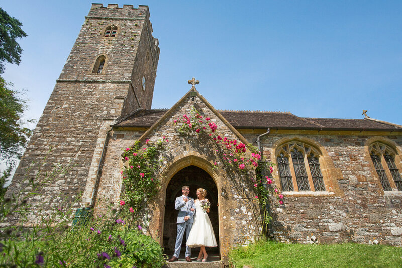 Just married couple in front of english chapel