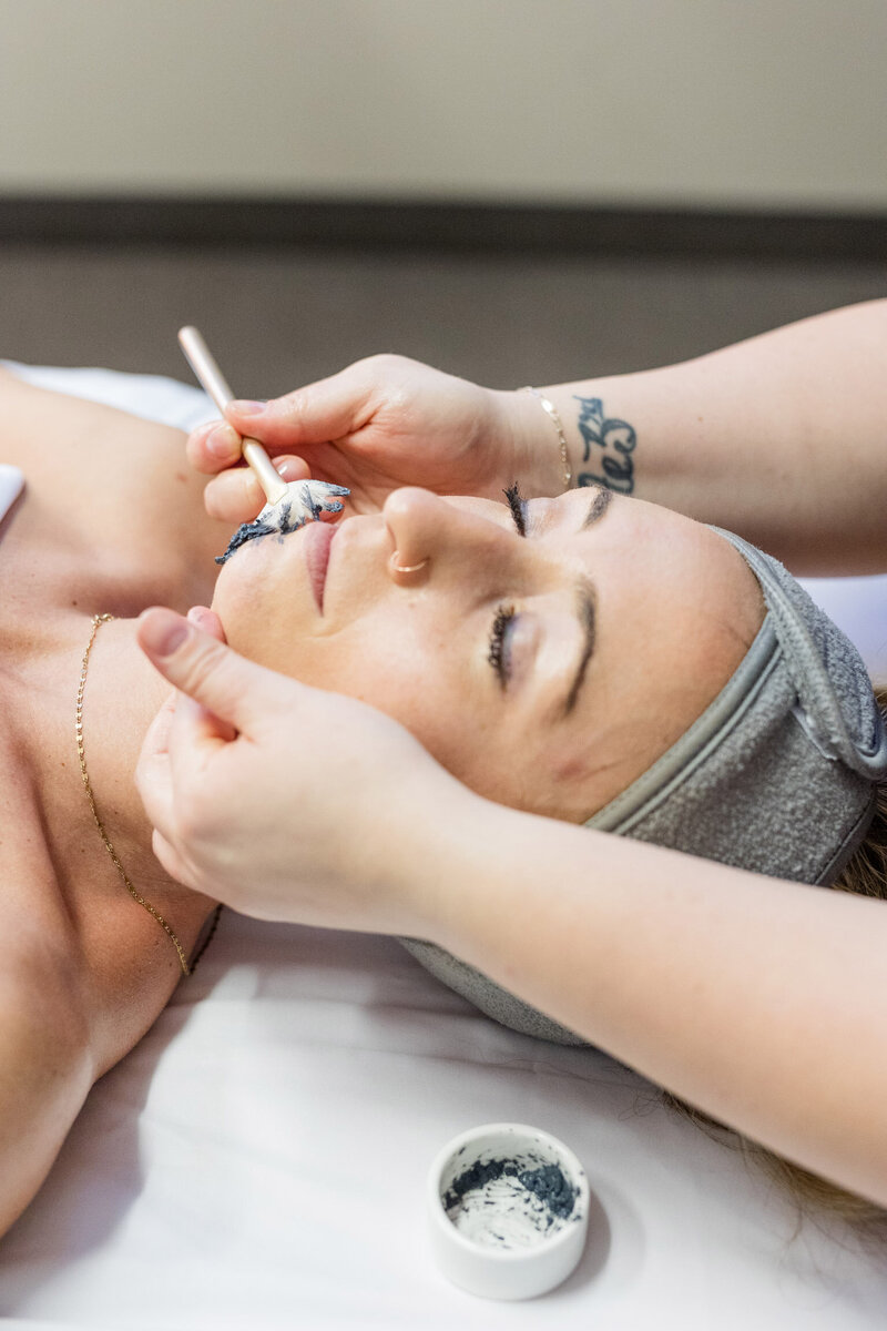 Client receiving a facial