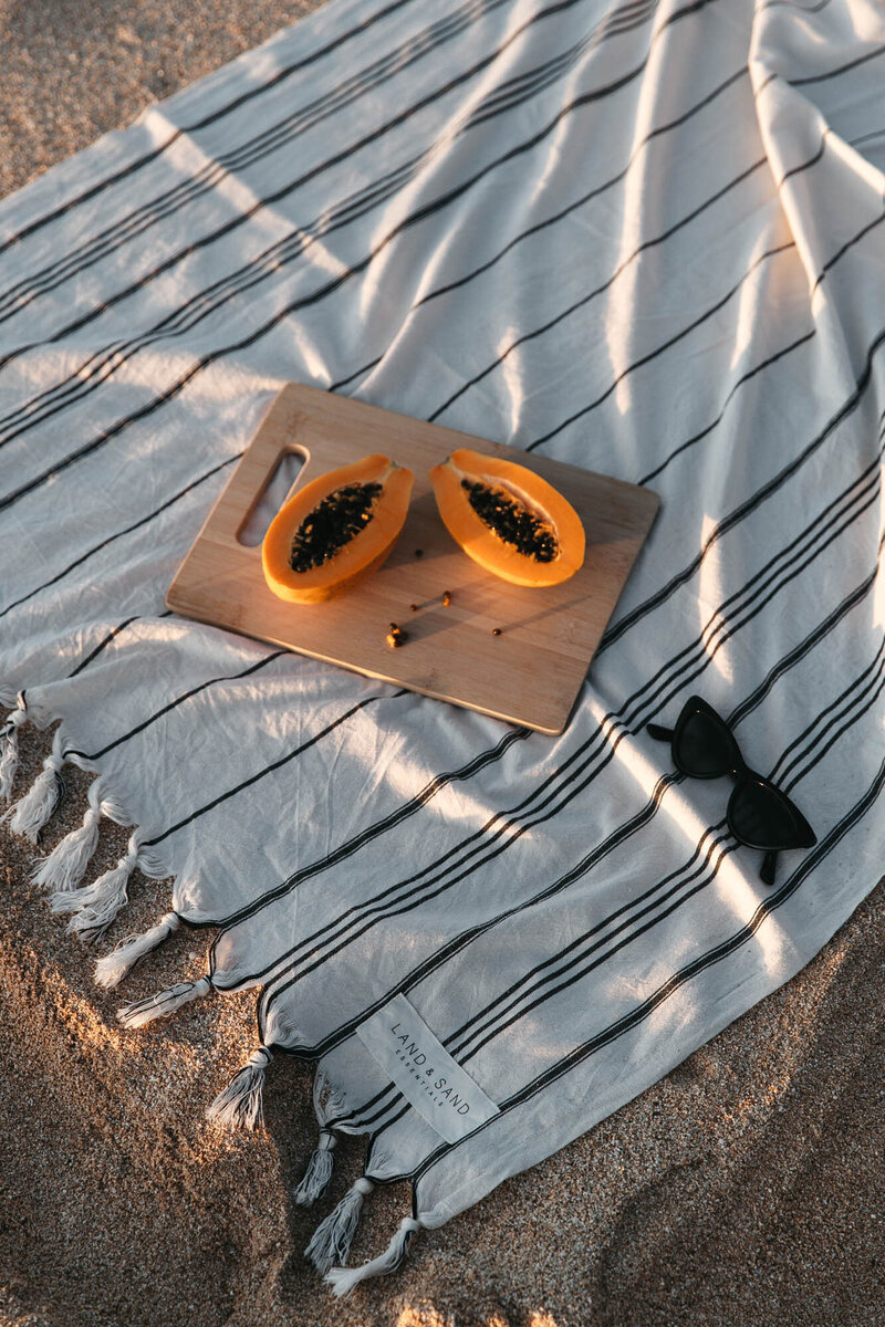 fruit-and-sunglasses-on-towel