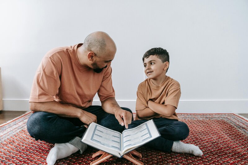Tutor sitting down with a student