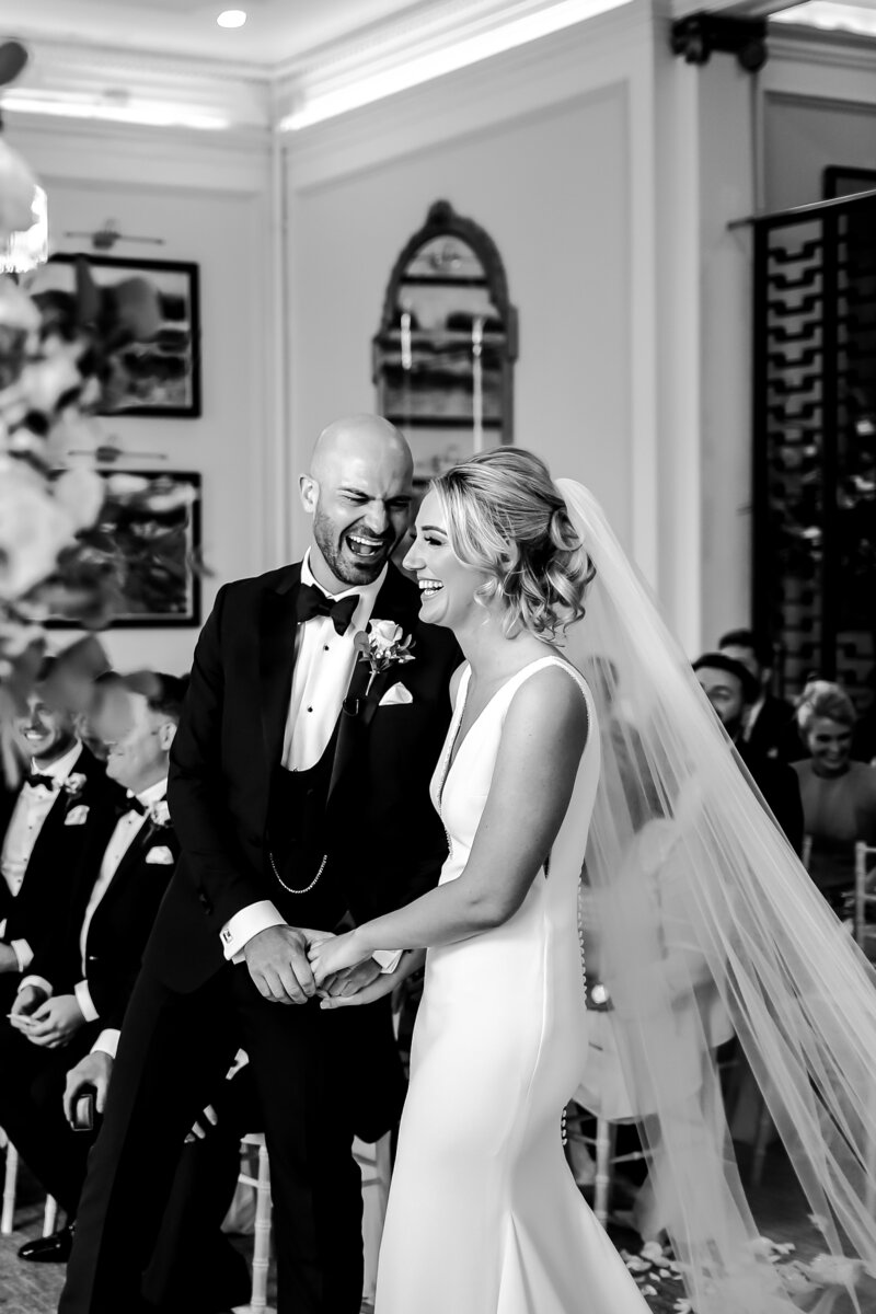 couple-laughing-in-black-and-white-at-luxury-wedding-in-provence