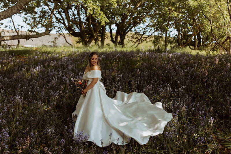 bridal portrait in statement dress in purple flowers