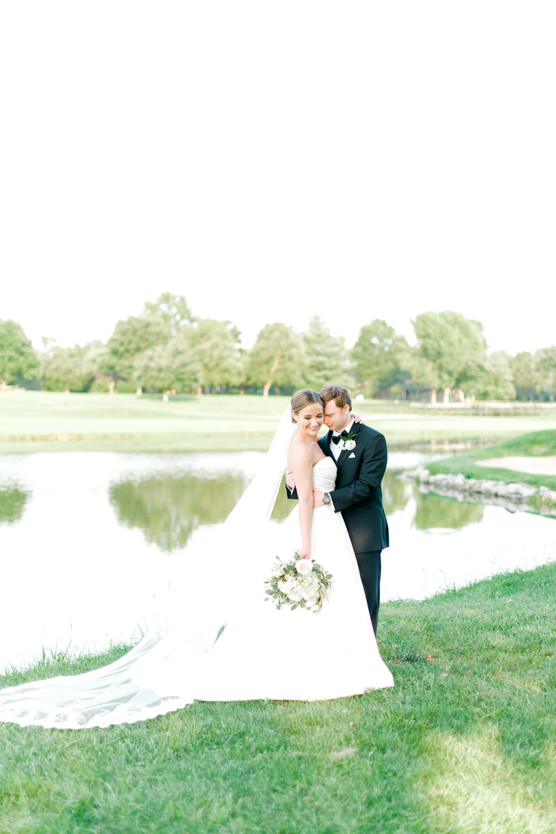 Bride and Groom embrace at Keene Trace Golf Club, Lexington Kentucky Wedding Photographer, Katelyn V. Photography