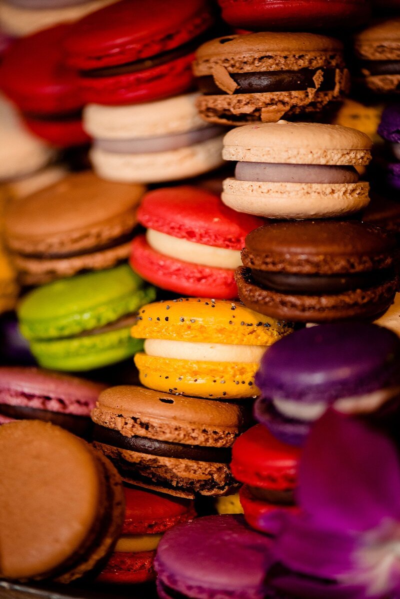 Colorful macaroons stacked together in a tower